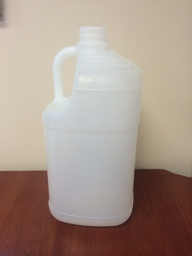 food and beverage white plastic jug with measurements on the side food safe