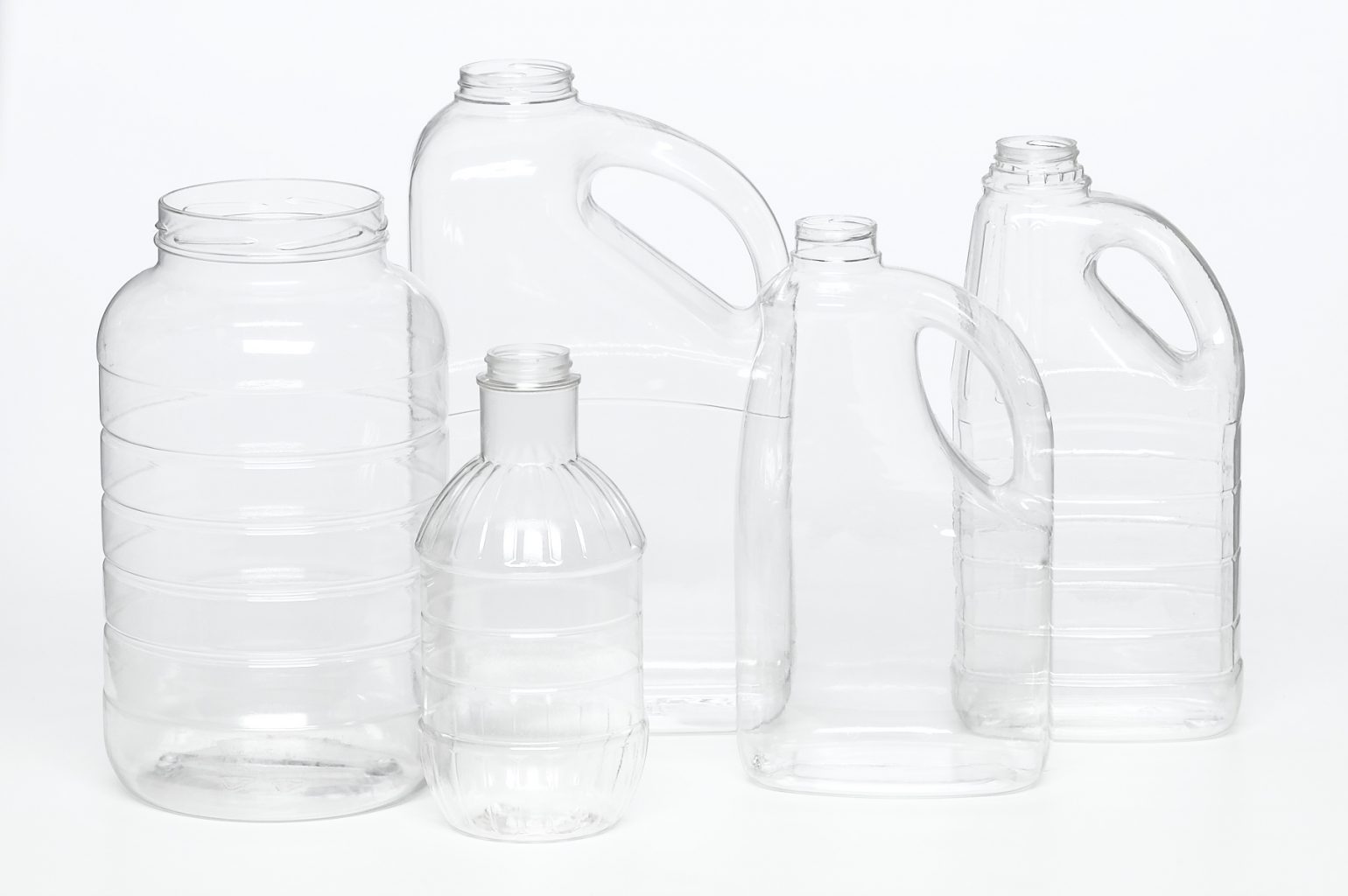 PET various sized clear plastic jugs with screw tops