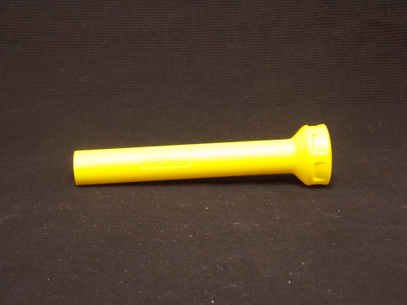 yellow plastic part