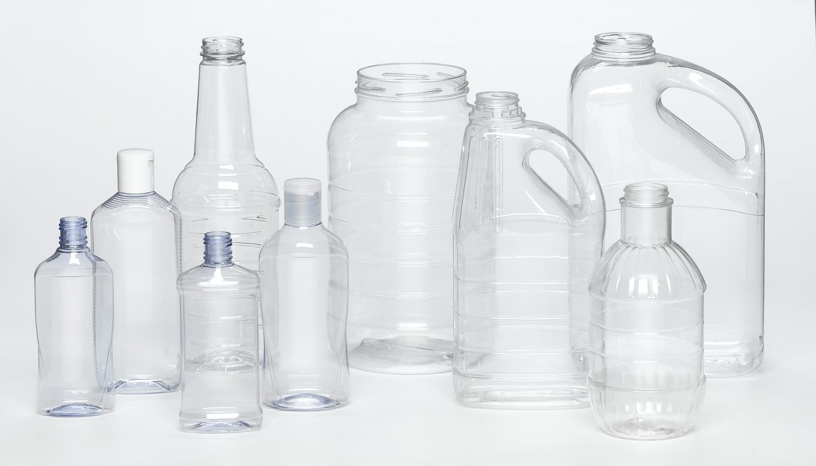 PET clear plastic bottles of various shapes and sizes